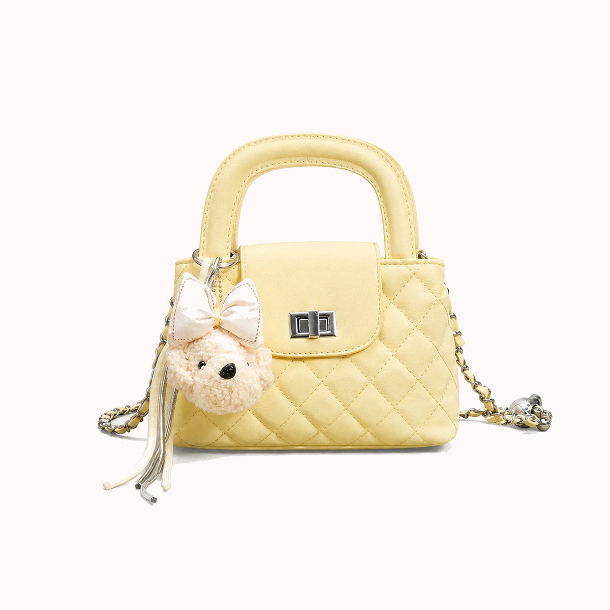 ARIPPULA FEF9F6 | nougat-quilted-handbag | close quality | 163__nougat-quilted-handbag__yellow__front.webp
