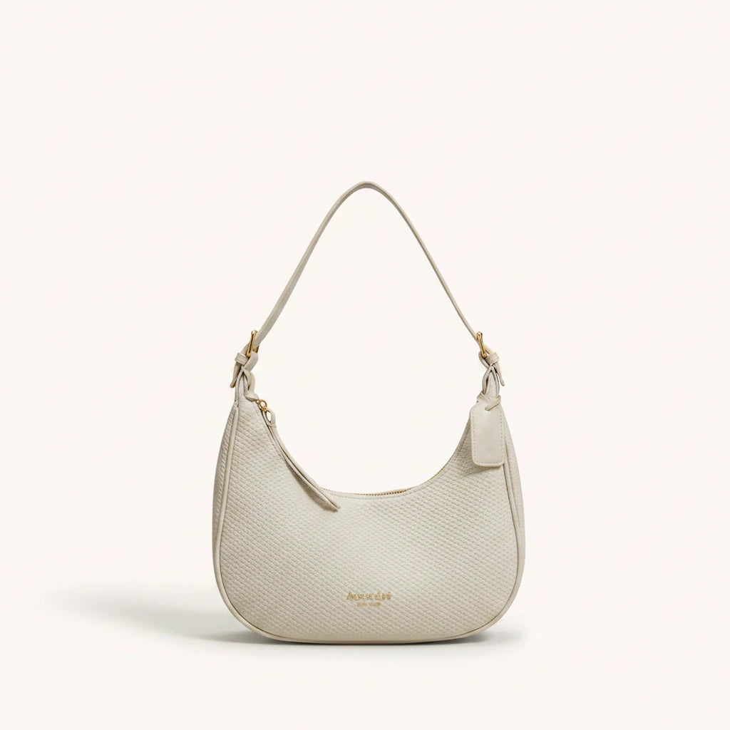 Moon Shoulder Bag — Pebbled | Remove the bg with text of the products and replace the bg with image reference i give and keep the showdow of the products
