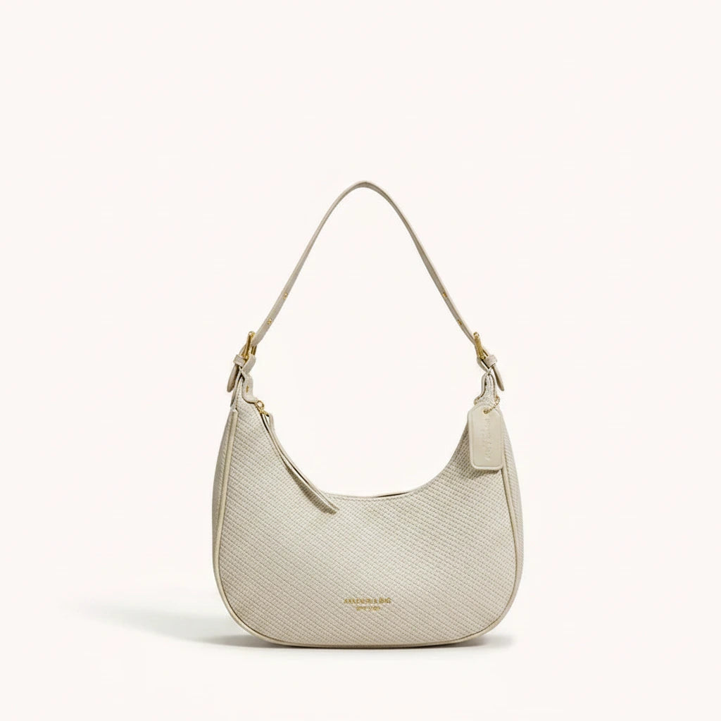 Moon Shoulder Bag — Pebbled | Remove the bg with text of the products and replace the bg with image reference i give and keep the showdow of the products