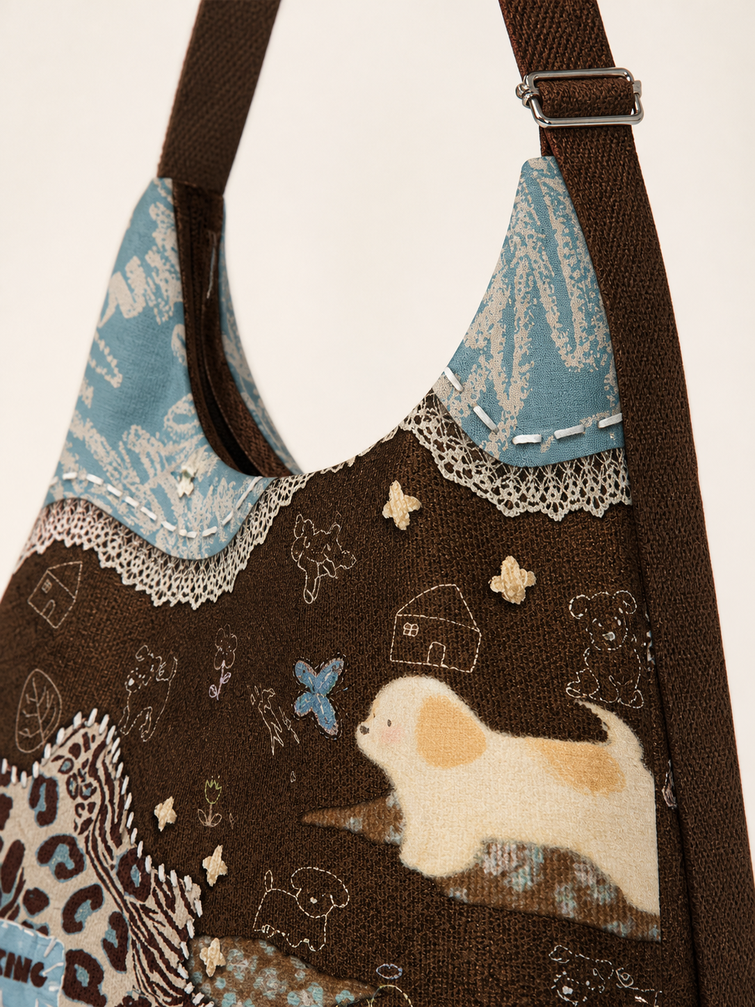 Caramel Puppy Canvas Crossbody Bag — panel and lace detail