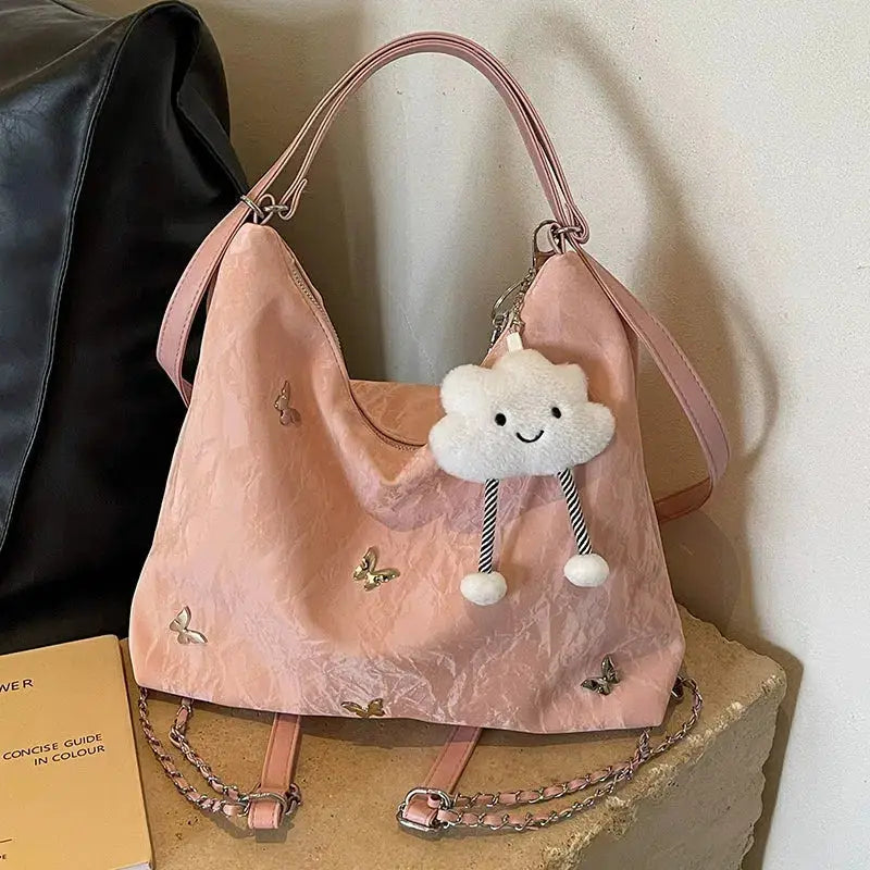 Schultertasche mit Nieten in Nebelblau