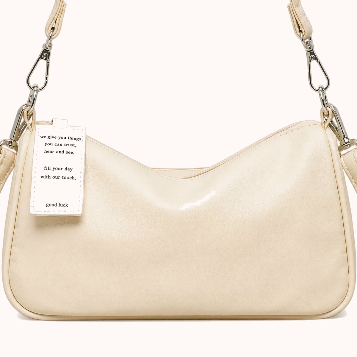 ARIPPULA FEF9F6 | butter-crescent-bag | close quality | 001__butter-crescent-bag__close-quality.webp