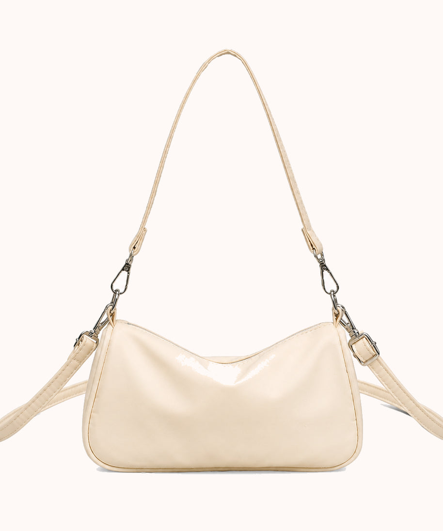 ARIPPULA FEF9F6 | butter-crescent-bag | front variant | 001__butter-crescent-bag__cream-front.webp