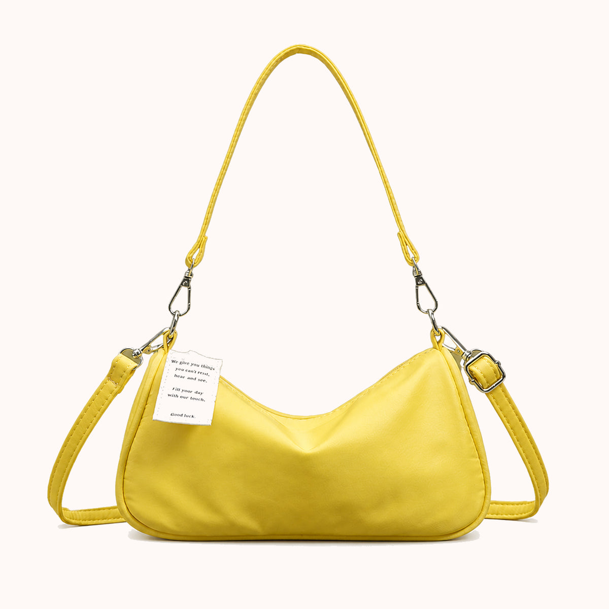 ARIPPULA FEF9F6 | butter-crescent-bag | close quality | 002__butter-crescent-bag__yellow__front.webp