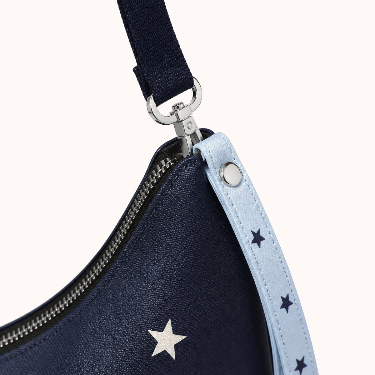 ARIPPULA FEF9F6 | starry-twin-cats-canvas-crossbody-bag | hardware detail | 012__starry-twin-cats-canvas-crossbody-bag__hardware-detail.webp