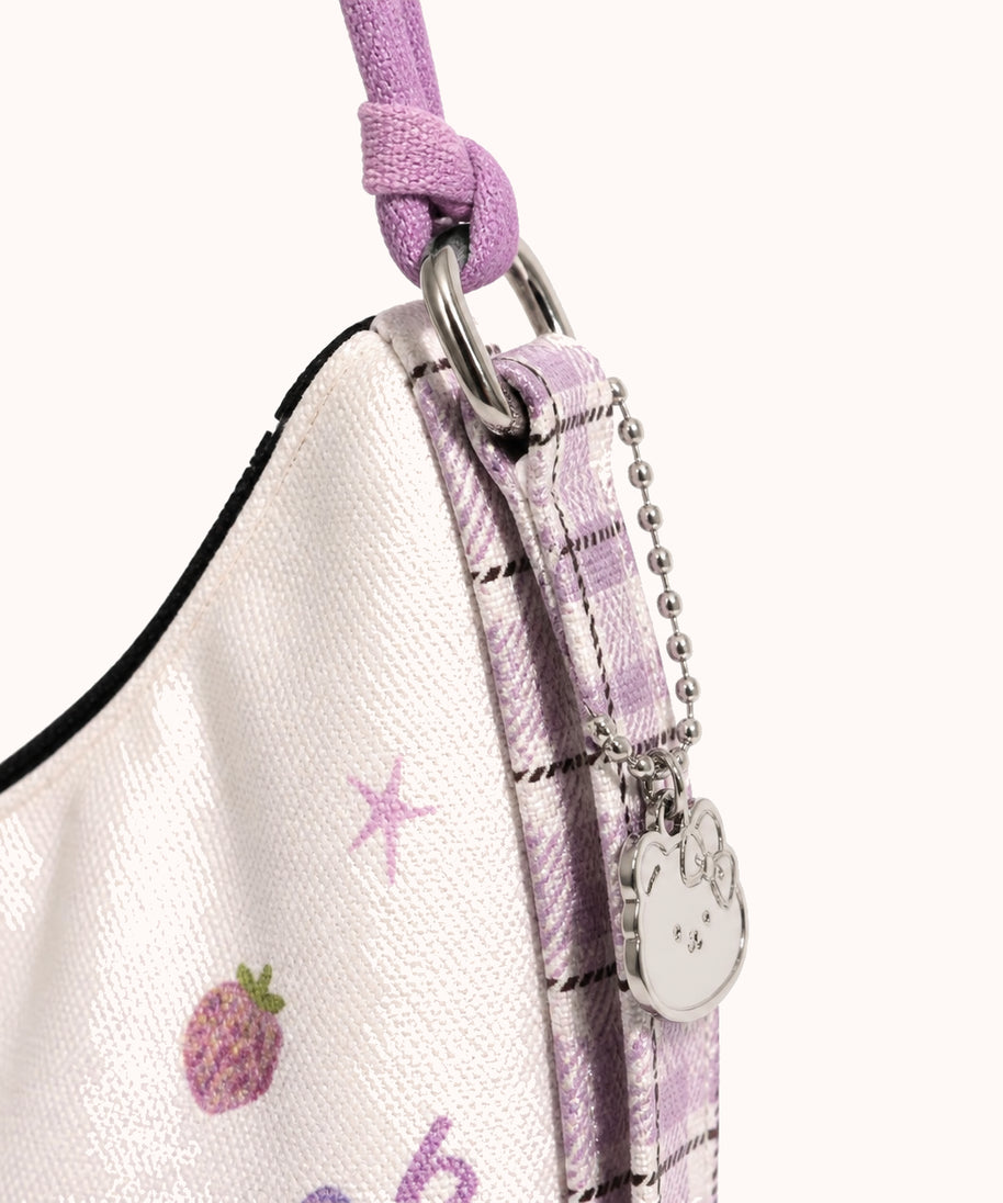 ARIPPULA FEF9F6 | berry-rain-cat-canvas-crossbody-bag | hardware detail | 020__berry-rain-cat-canvas-crossbody-bag__hardware-detail.webp