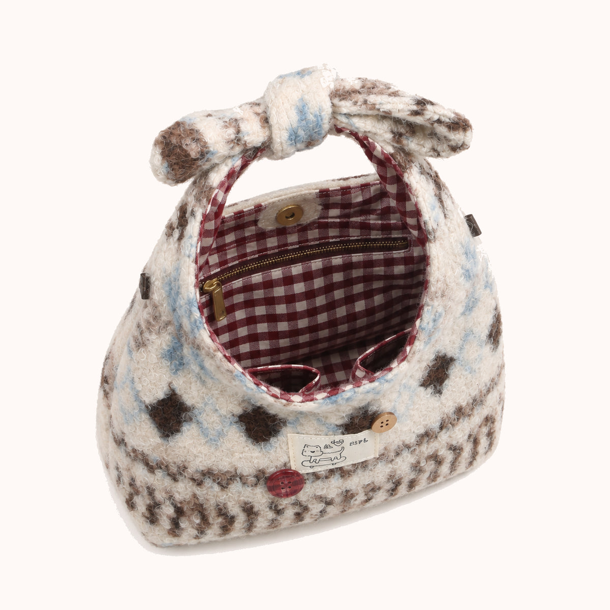 ARIPPULA FEF9F6 | chalet-knit-bucket-bag | interior | 054__chalet-knit-bucket-bag__interior.webp