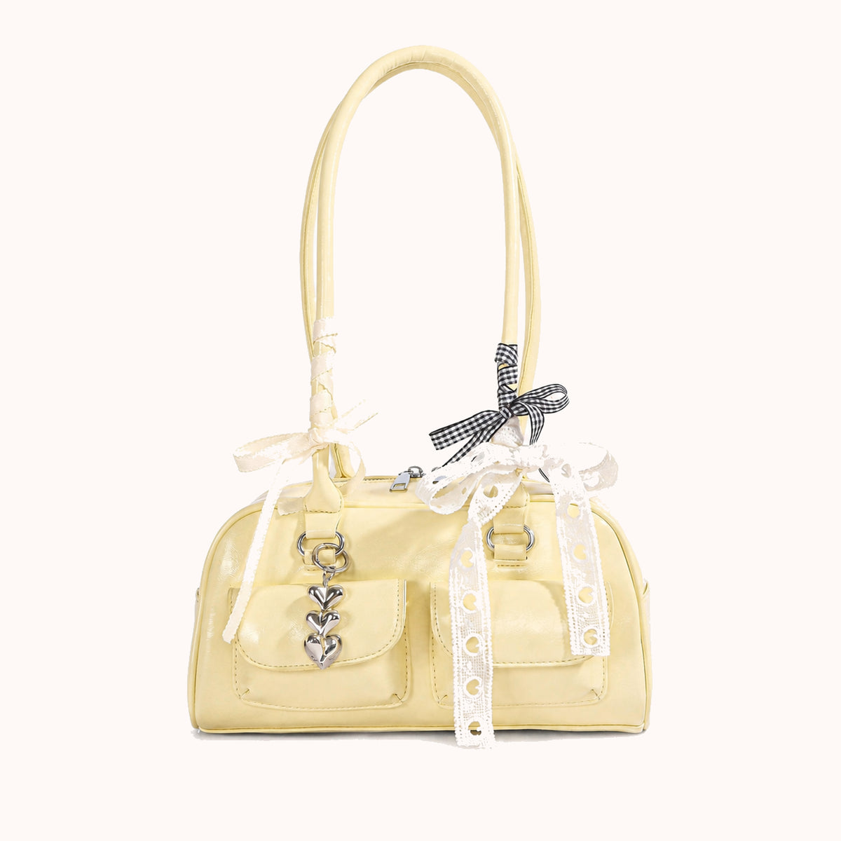 ARIPPULA FEF9F6 | opera-smooth-shoulder-bag | close quality | 084__opera-smooth-shoulder-bag__yellow-charm__front.webp