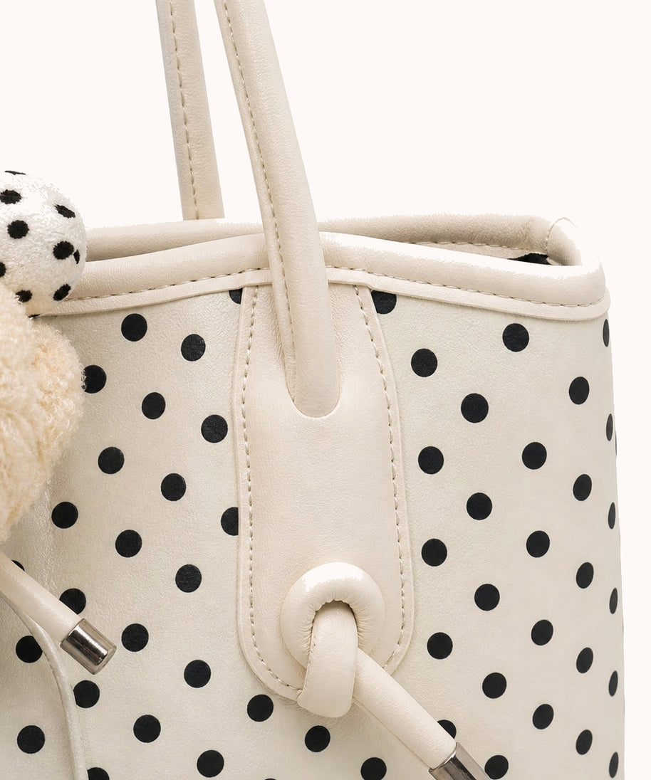 ARIPPULA FEF9F6 | dalmatian-polka-dot-tote | hardware detail | 116__dalmatian-polka-dot-tote__hardware-detail.webp