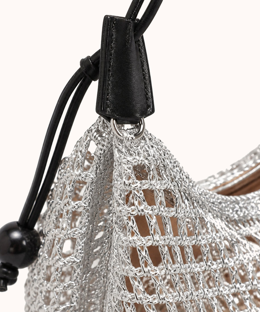 ARIPPULA FEF9F6 | trellis-woven-shoulder-bag | hardware detail | 140__trellis-woven-shoulder-bag__hardware-detail.webp