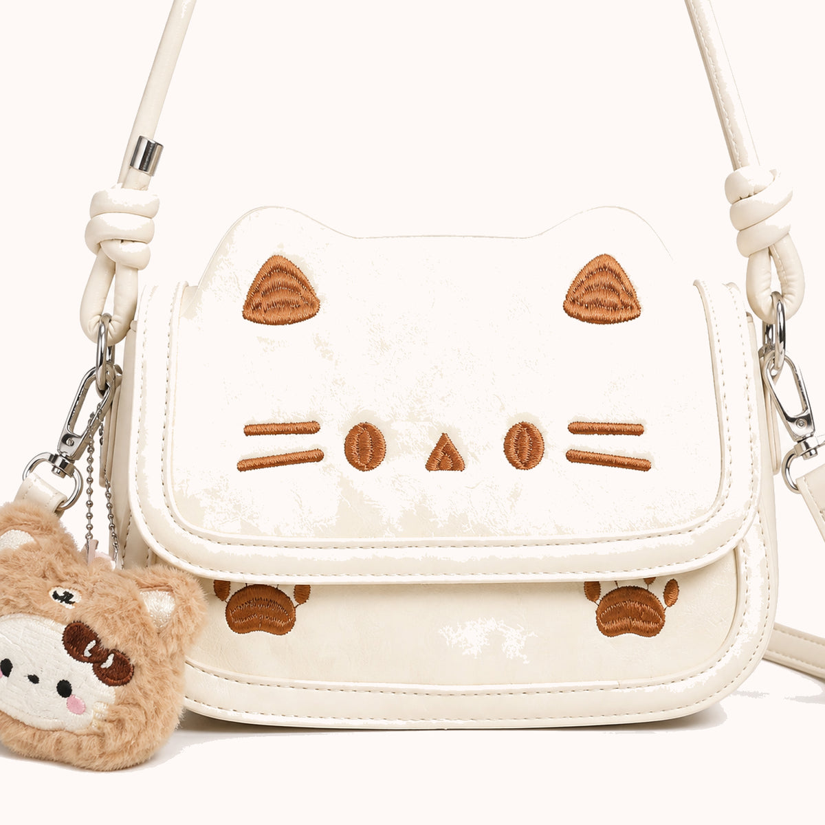 ARIPPULA FEF9F6 | mittens-printed-crossbody-bag | close quality | 145__mittens-printed-crossbody-bag__close-quality.webp