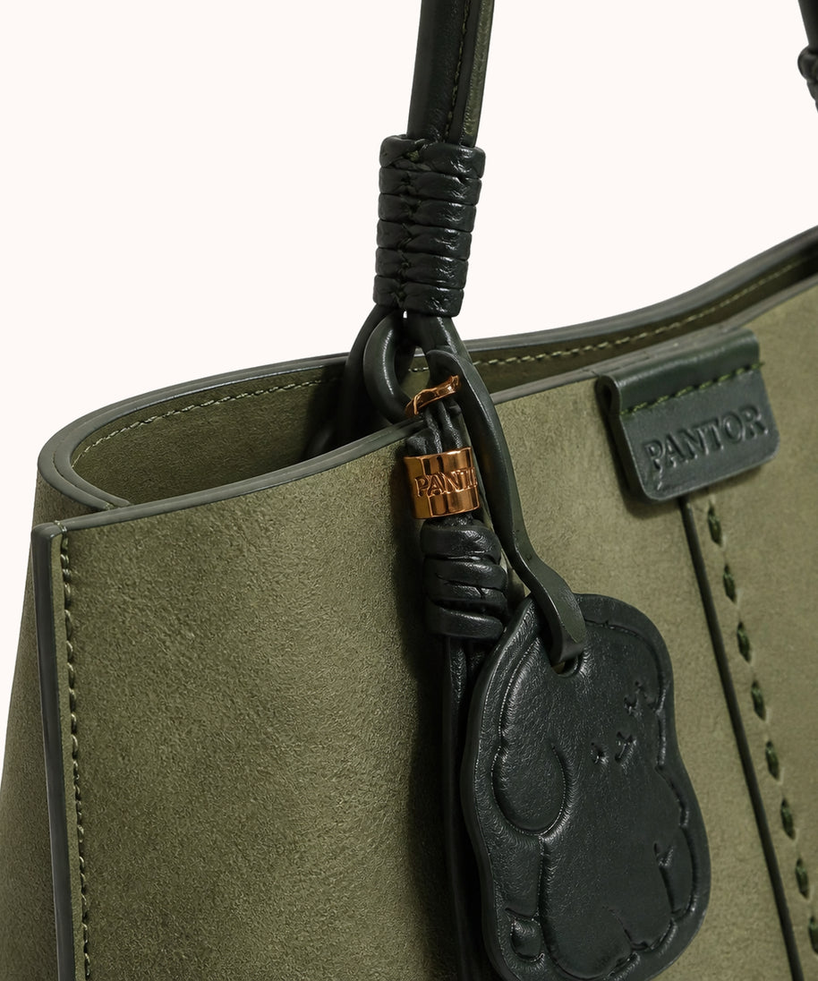 ARIPPULA FEF9F6 | sage-canvas-tote | hardware detail | 153__sage-canvas-tote__hardware-detail.webp