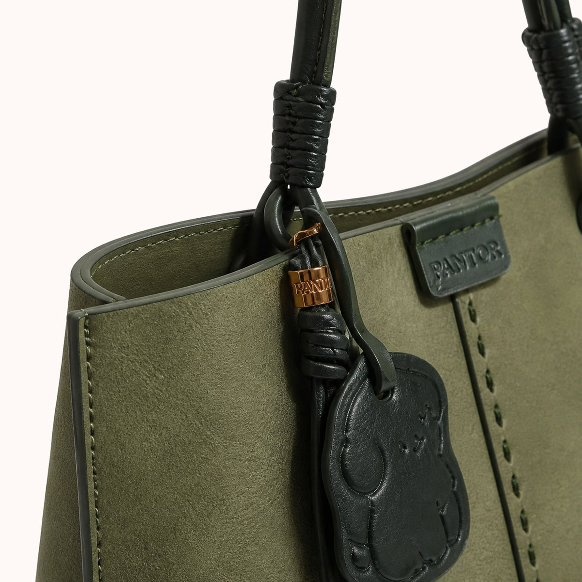 ARIPPULA FEF9F6 | sage-canvas-tote | hardware detail | 153__sage-canvas-tote__hardware-detail.webp