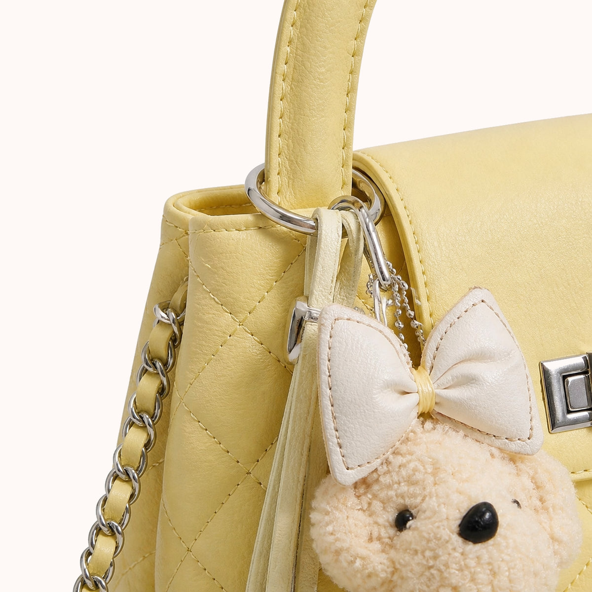 ARIPPULA FEF9F6 | nougat-quilted-handbag | hardware detail | 163__nougat-quilted-handbag__hardware-detail.webp