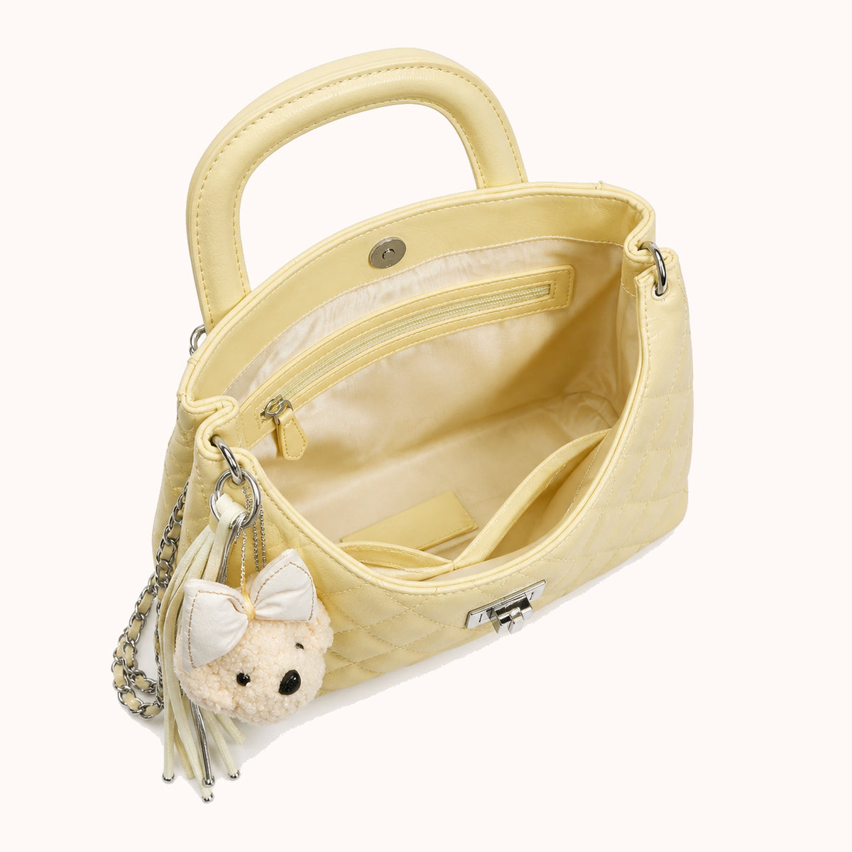 ARIPPULA FEF9F6 | nougat-quilted-handbag | interior | 163__nougat-quilted-handbag__interior.webp
