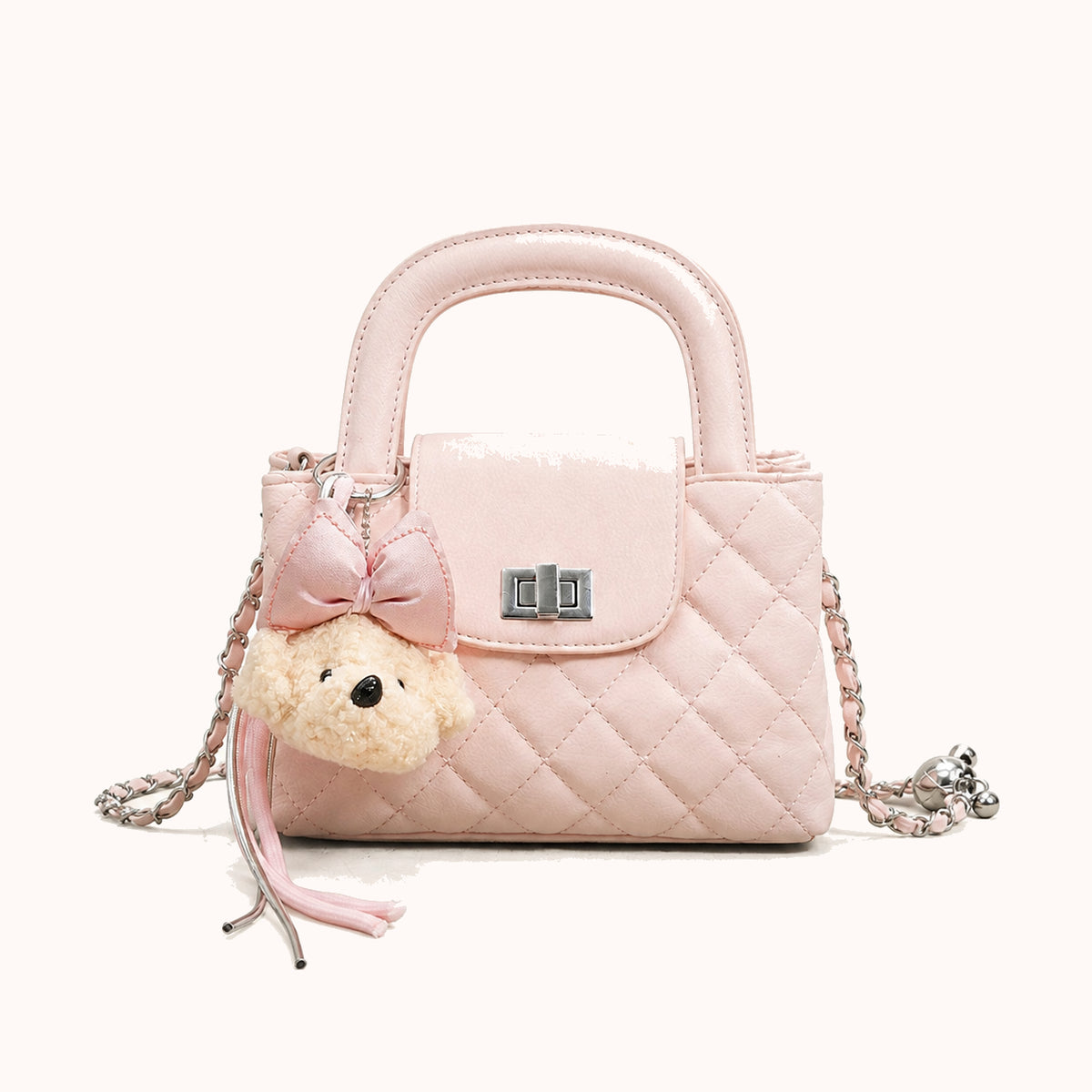 ARIPPULA FEF9F6 | nougat-quilted-handbag | close quality | 165__nougat-quilted-handbag__pink__front.webp