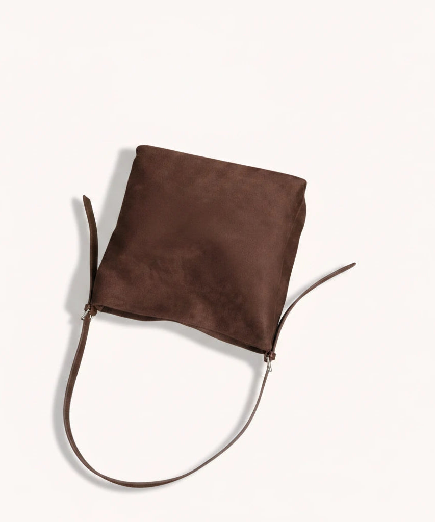 Hazel Shoulder Tote — Brushed Suede | Remove the bg with text of the products and replace the bg with image reference i give and keep the showdow of the products