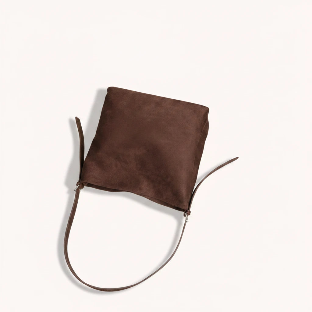 Hazel Shoulder Tote — Brushed Suede | Remove the bg with text of the products and replace the bg with image reference i give and keep the showdow of the products