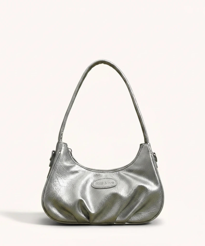 Ink Shoulder Bag — Patent | Remove the bg with text of the products and replace the bg with image reference i give and keep the showdow of the products