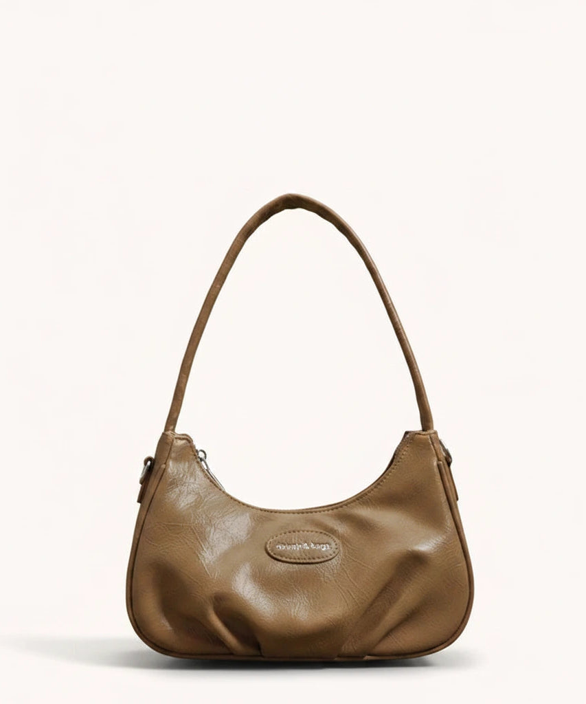 Ink Shoulder Bag — Patent | Remove the bg with text of the products and replace the bg with image reference i give and keep the showdow of the products