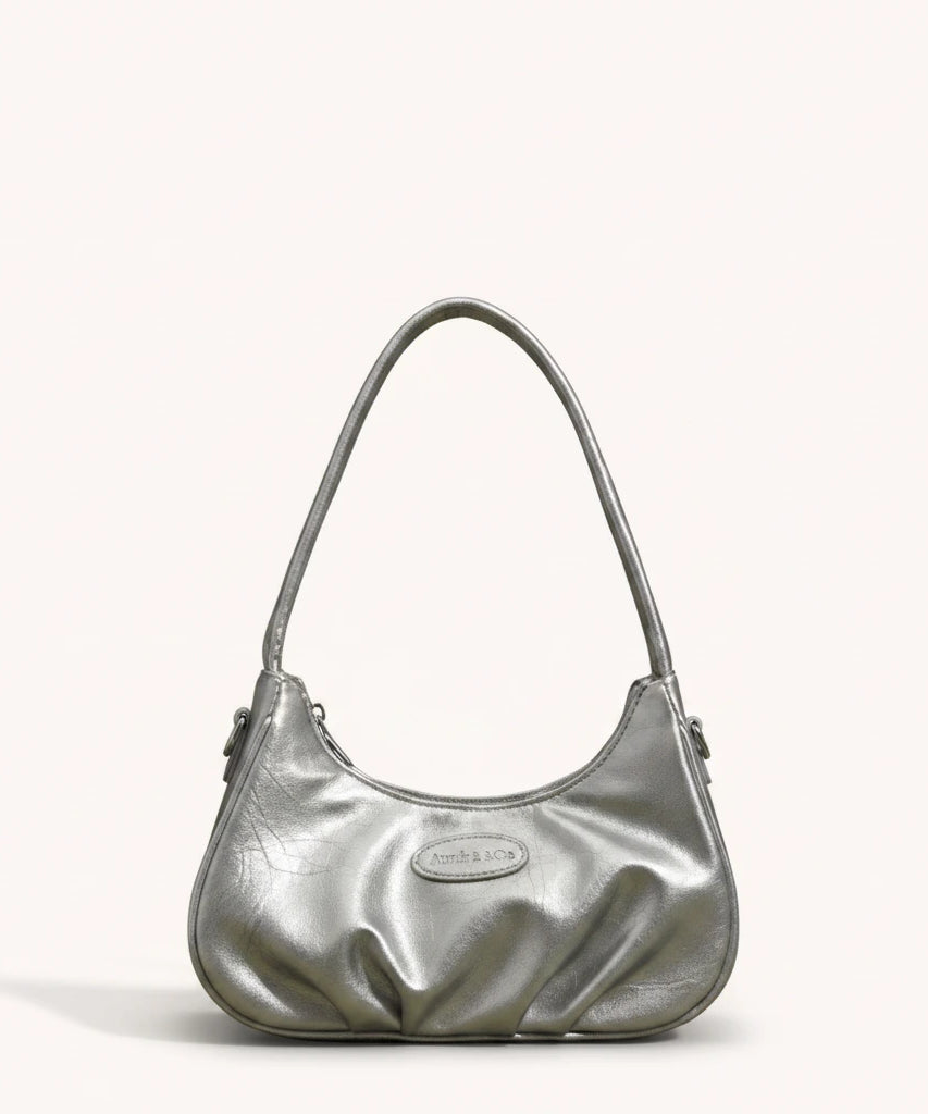 Ink Shoulder Bag — Patent | Remove the bg with text of the products and replace the bg with image reference i give and keep the showdow of the products