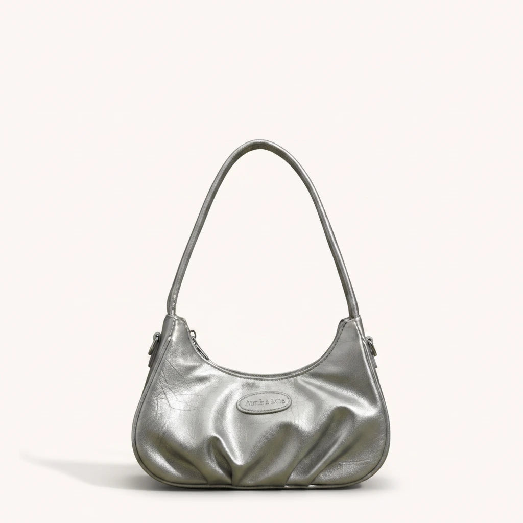 Ink Shoulder Bag — Patent | Remove the bg with text of the products and replace the bg with image reference i give and keep the showdow of the products