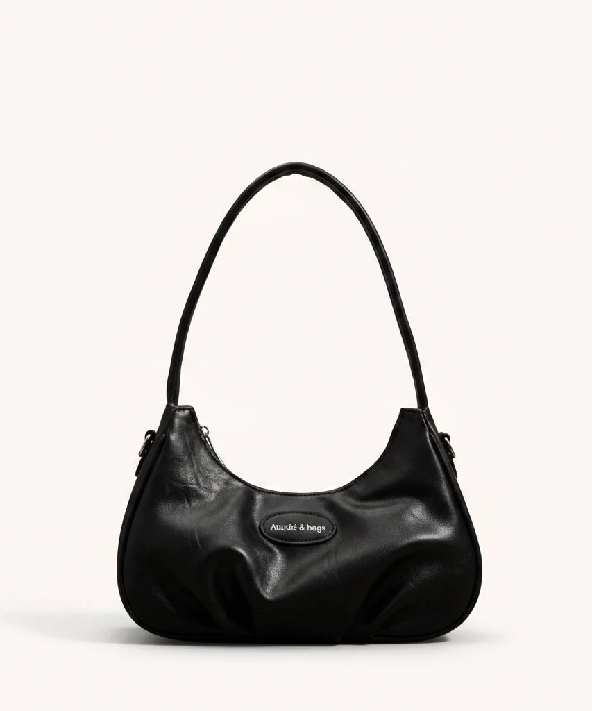 Ink Shoulder Bag — Patent | Remove the bg with text of the products and replace the bg with image reference i give and keep the showdow of the products