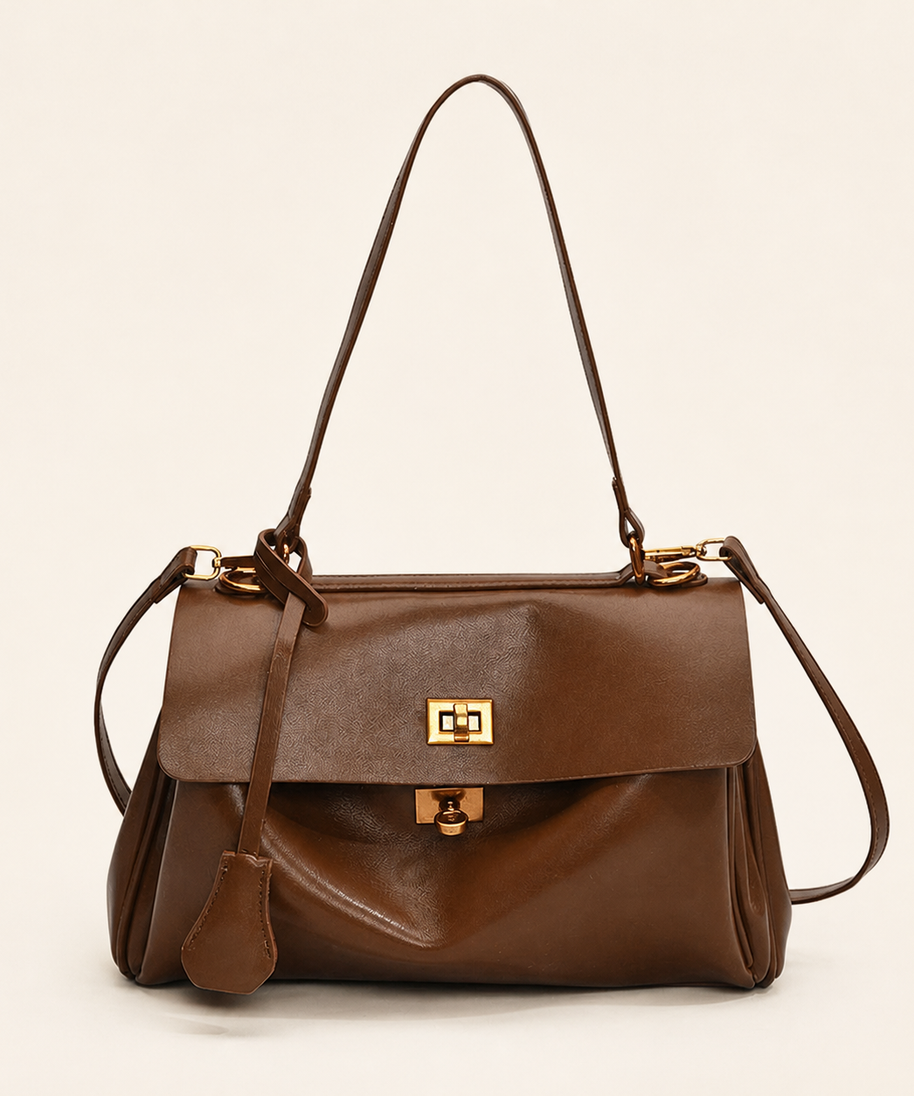 Audrey Vintage Turn-Lock Satchel Bag front view on warm ivory background