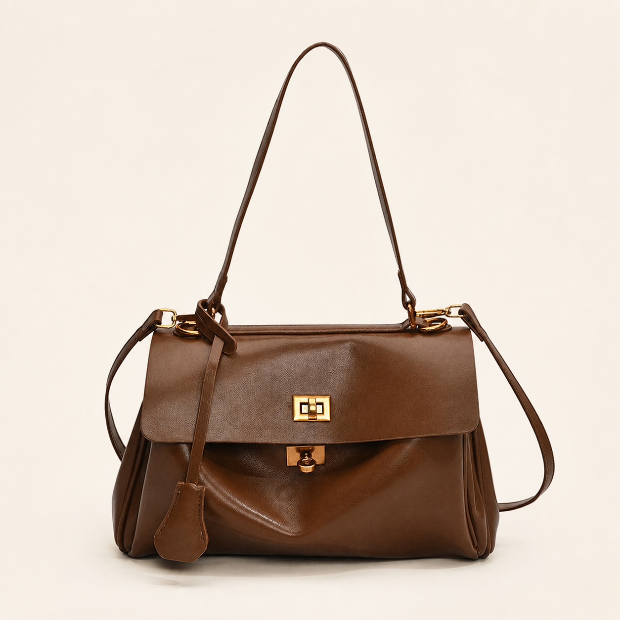 Audrey Vintage Turn-Lock Satchel Bag front view on warm ivory background