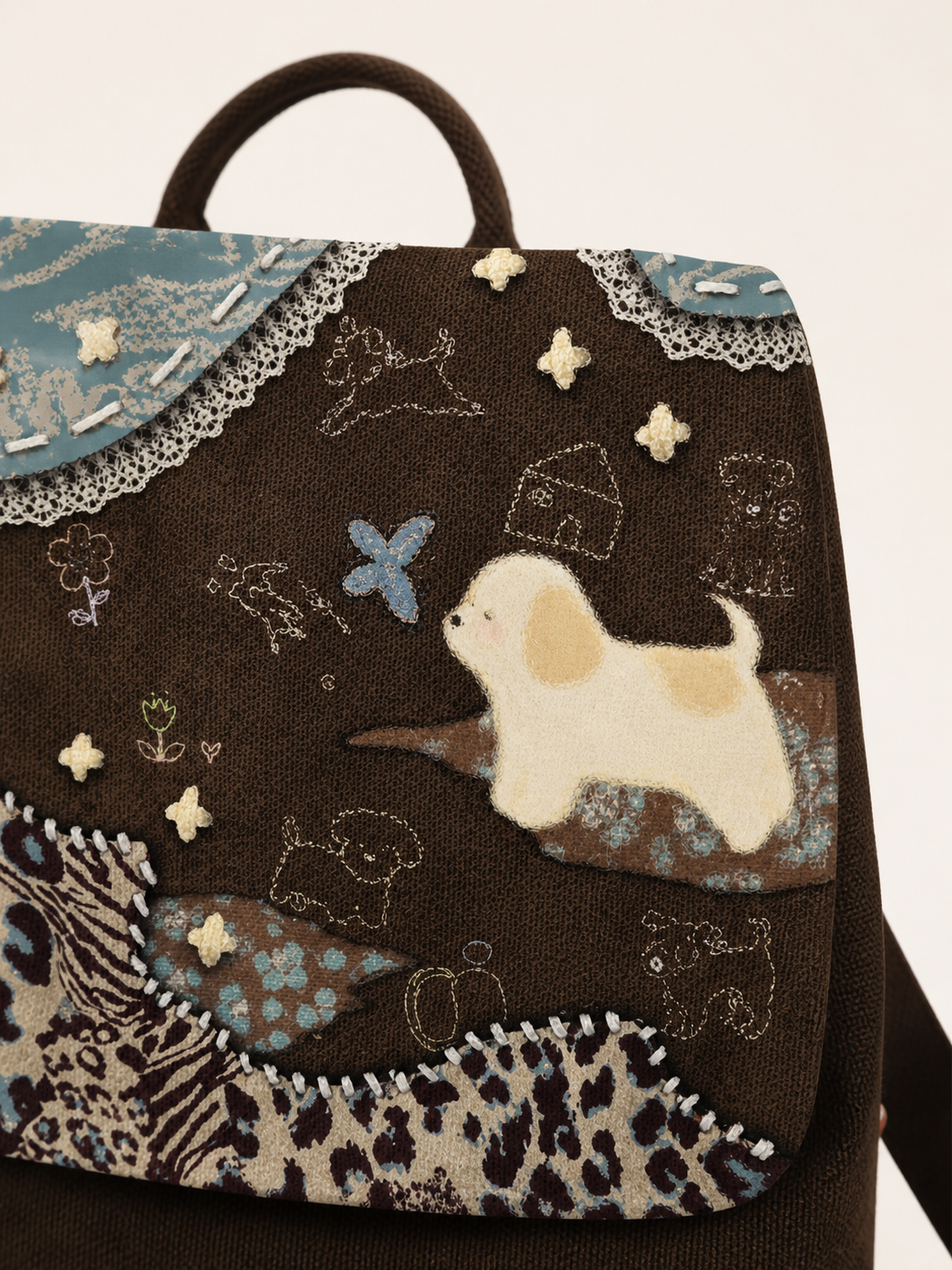 Caramel Puppy Canvas Flap Backpack — puppy artwork detail