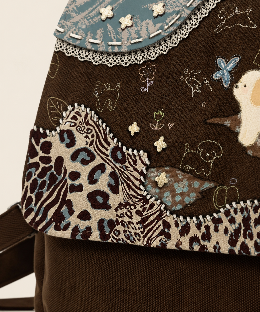 Caramel Puppy Canvas Flap Backpack — patchwork detail