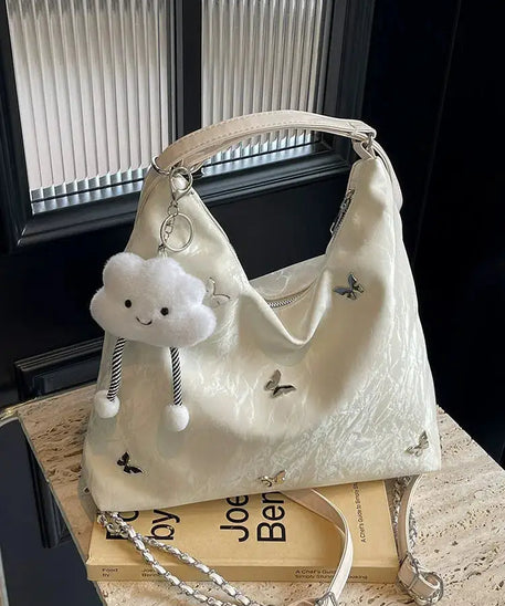 Schultertasche mit Nieten in Nebelblau