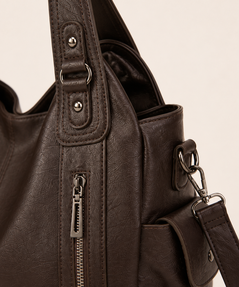 Harper tote vertical zipper, handle and strap hardware detail