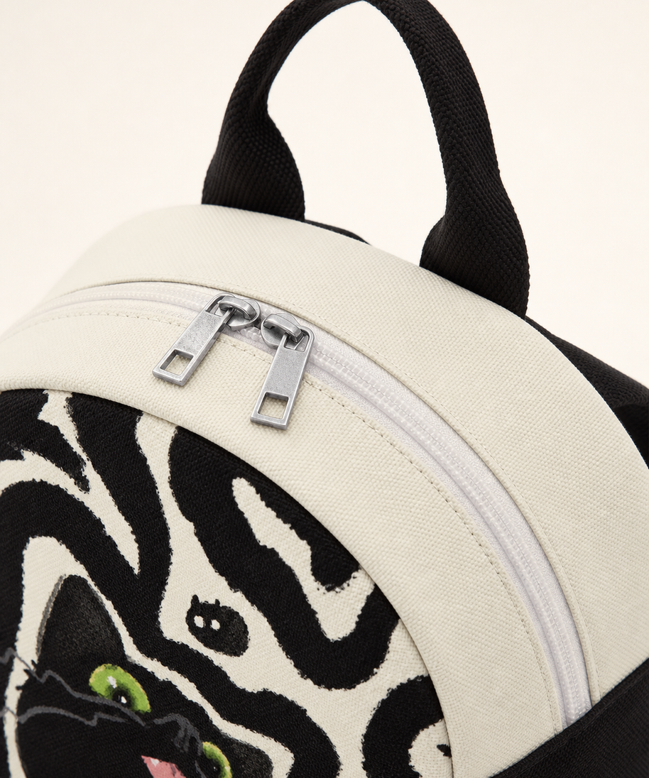Little Black Canvas Backpack — handle detail