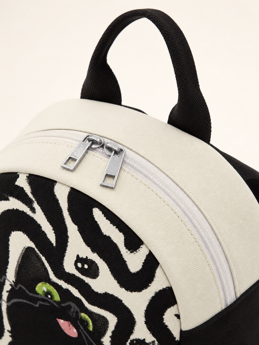 Little Black Canvas Backpack — handle detail