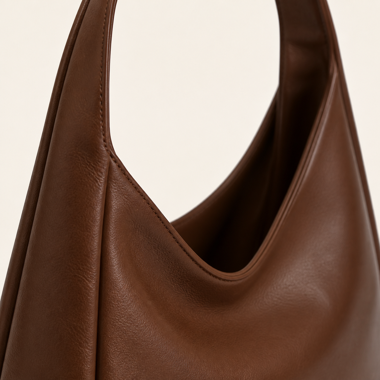 Marlow hobo bag integrated handle and leather material detail