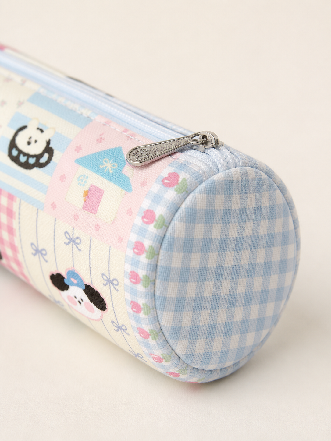 Patchwork Park Canvas Round Pencil Case — end-cap detail