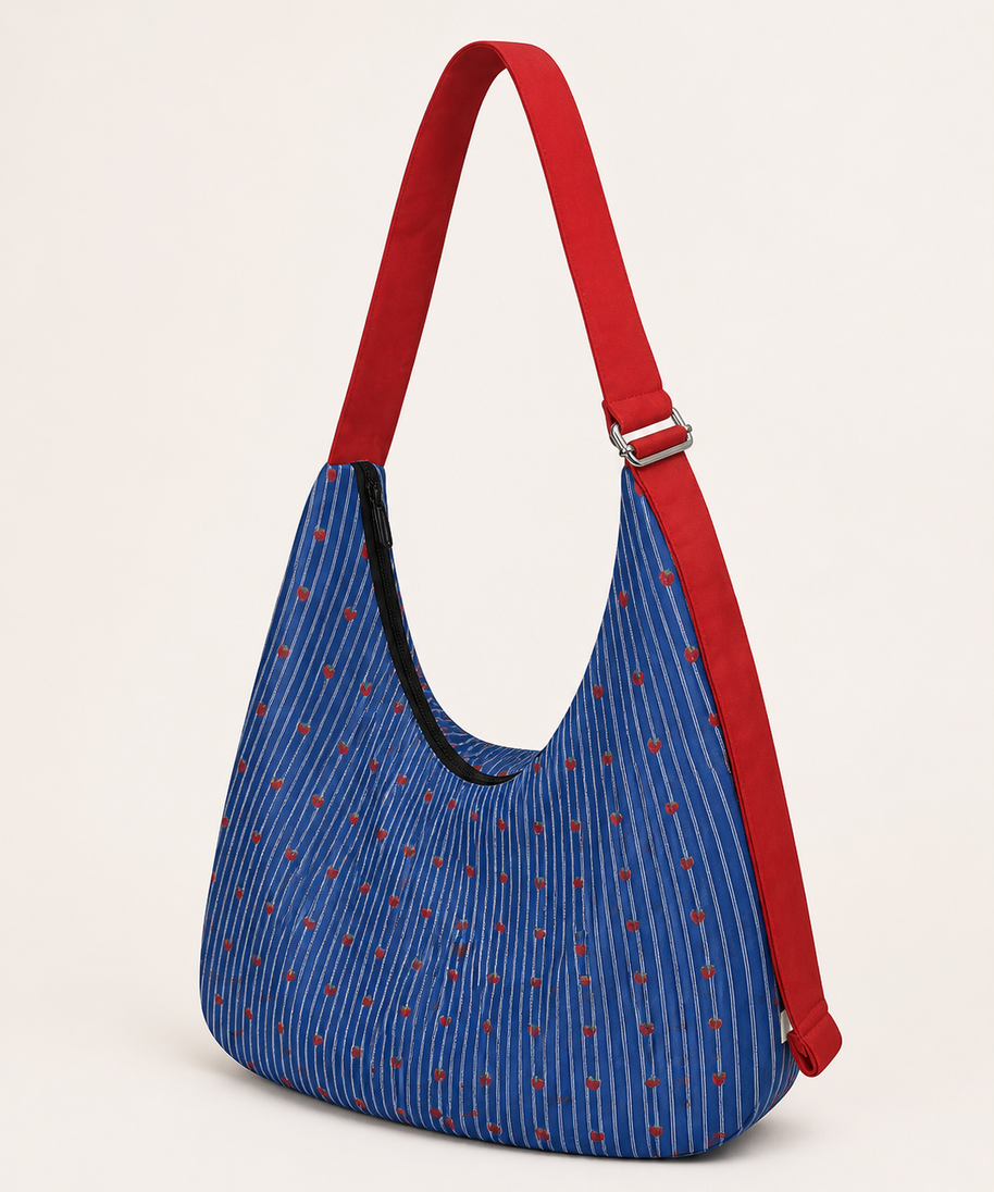 Strawberry Dot Canvas Crossbody Bag — strap and hardware detail